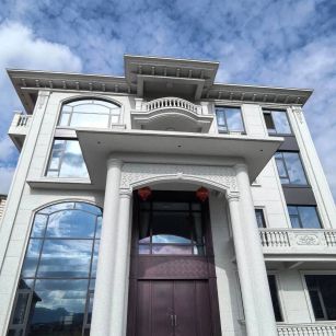 菏泽白麻别墅外墙干挂石材效果示例