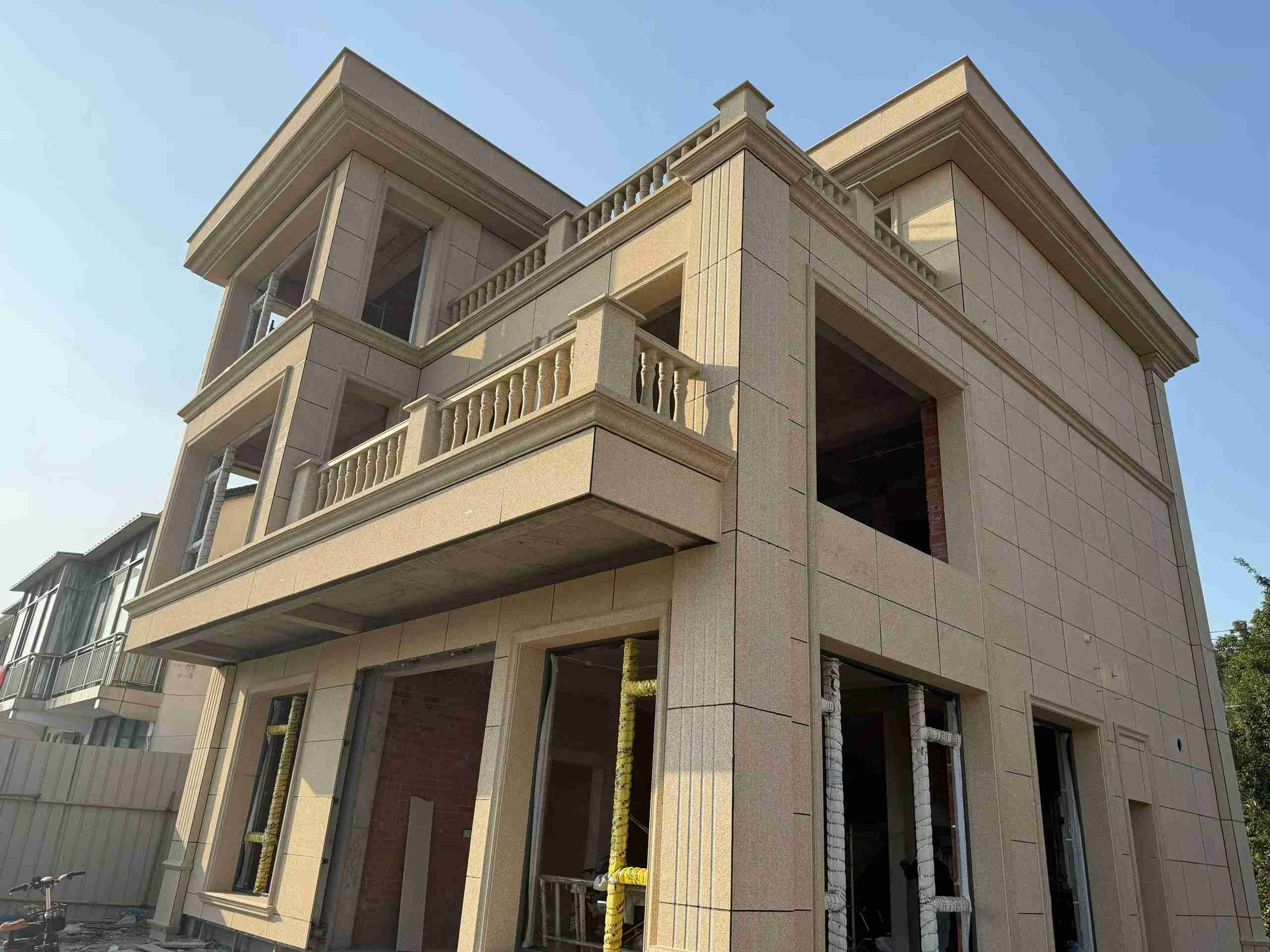 菏泽 黄金麻花岗岩石材荔枝面外墙干挂效果展示